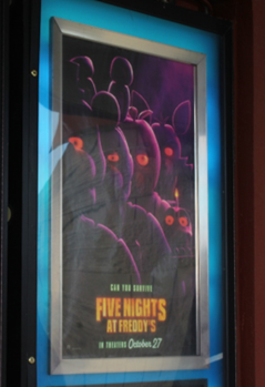 A picture of the main poster for the ‘FNAF’ movie, taken at Regal movie theatre, which is airing the movie, along with most movie theatres near Brownsburg on October 27, 2023.”