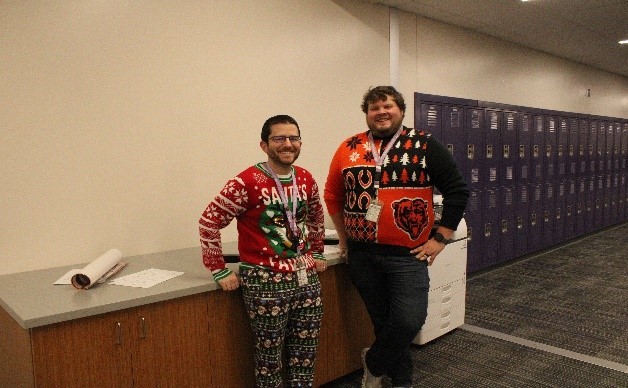 Science teachers Nick Friedman and Drew Timm dress in ugly winter sweaters for a spirit day on Dec. 1, 2023. 