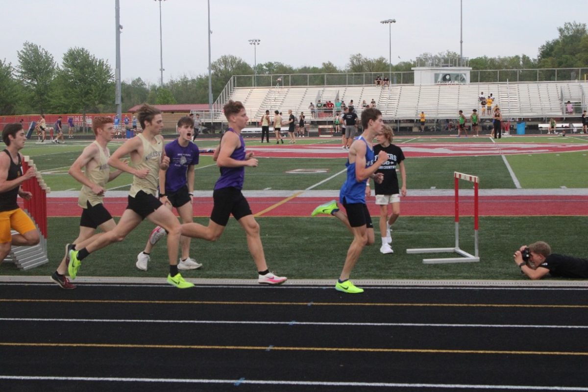 Junior Ian Baker running the 1600-meter run at HCC. Baker ran a 4:14, managing to outkick the competition to become the HCC 1600-meter champion for the second year in a row.