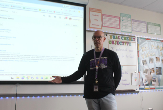 Teacher Bryan Padgett informs his Dual Credit Speech class on the details of their final speech. He goes over the information that must be included and how the speech should be presented. 